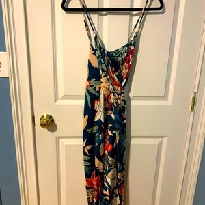 Floral deep cut, slit wrap dress.